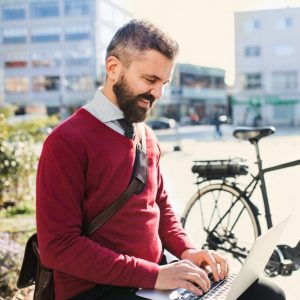 hipster-businessman-commuter-with-bicycle-on-the-w-2021-04-02-15-22-06-utc-e1627959888572.jpg